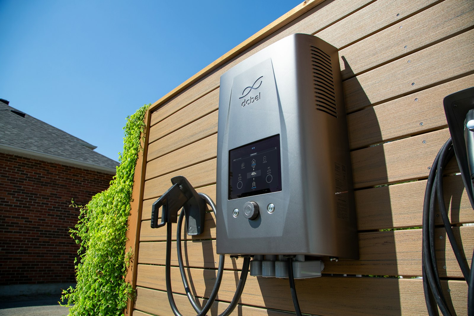 Home EV charger mounted on a wall