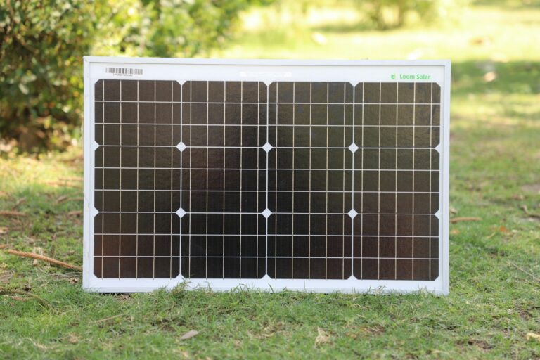 Solar panel set up on grass in the sun